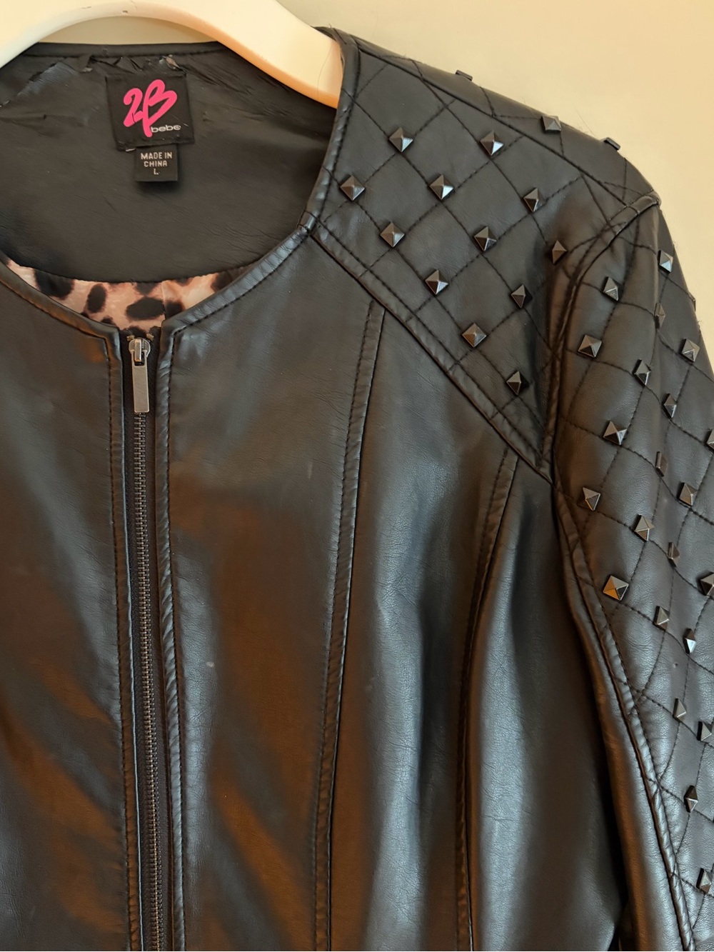 2B Bebe size L black faux leather jacket with studs